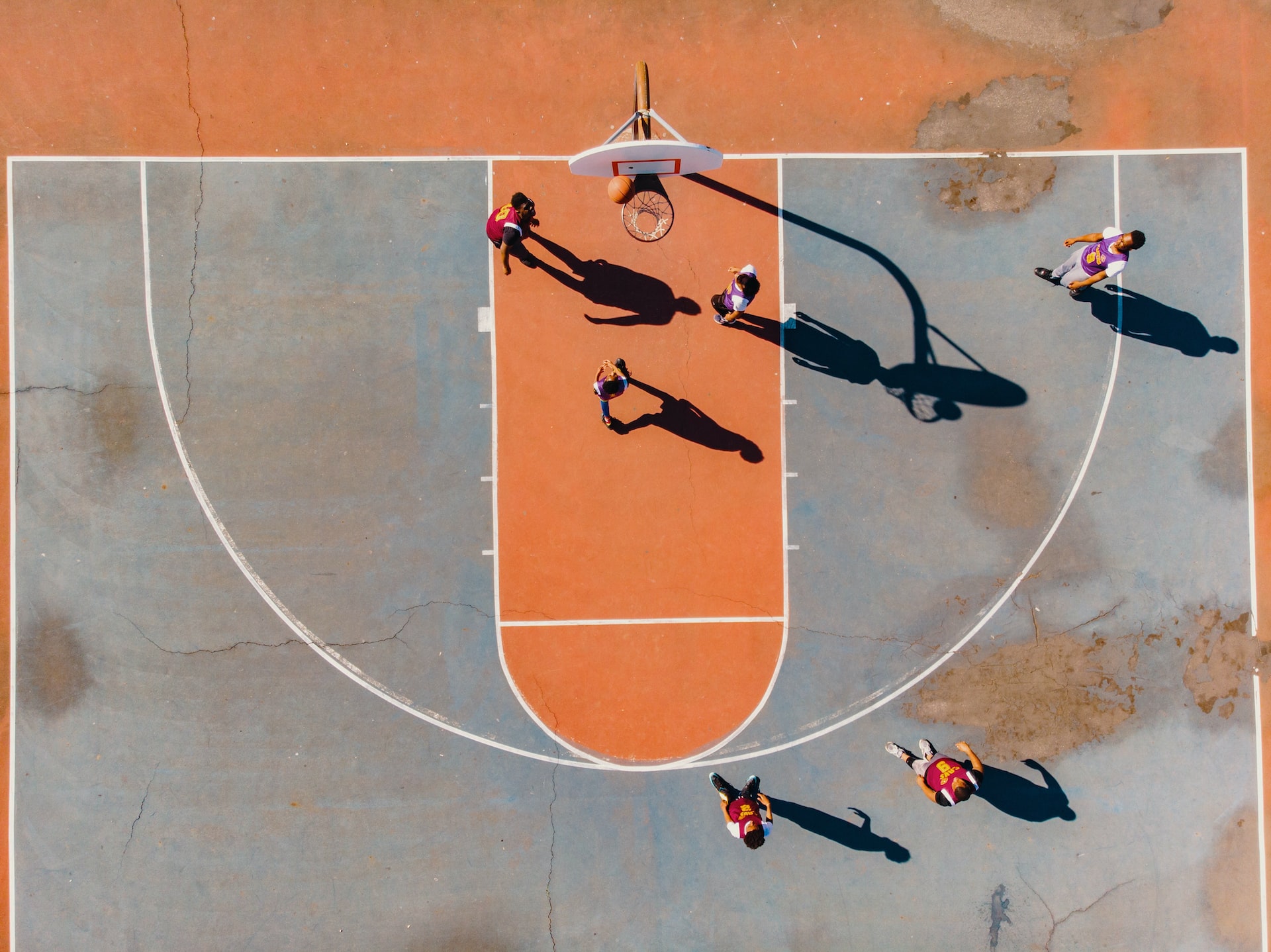 aerial photography of men playing basketball